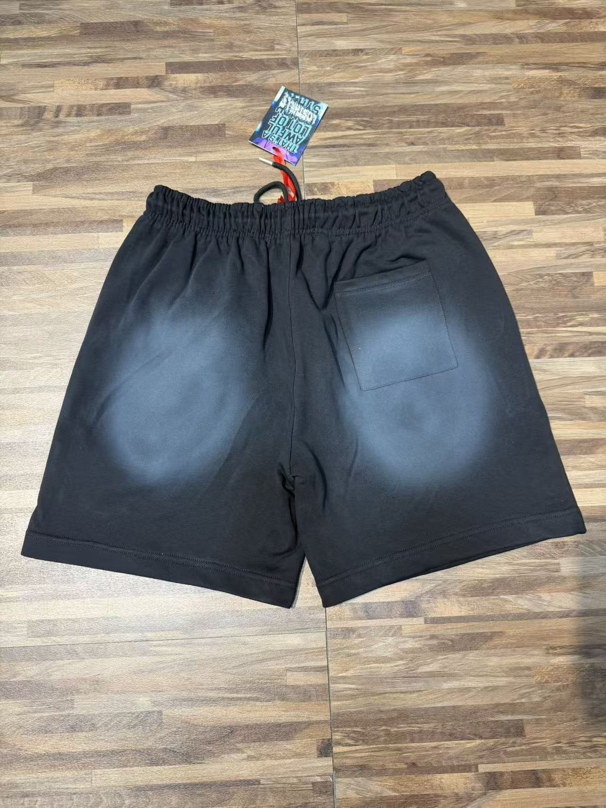 THAT'S A AWFUL LOT OF COUGH SYRUP Black Front Graphic Shorts