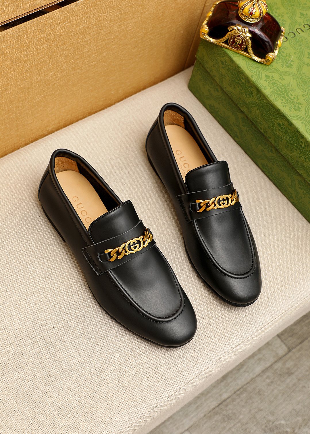 Gucci Leather Chain Loafers