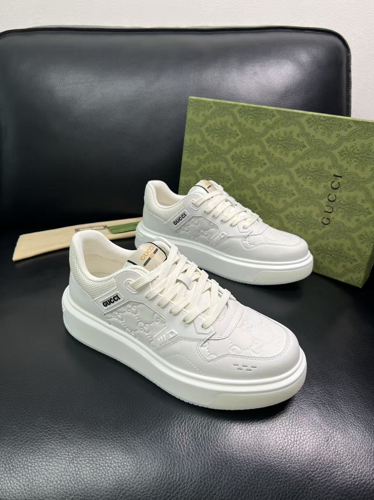 Gucci Embossed Low-Top Sneakers