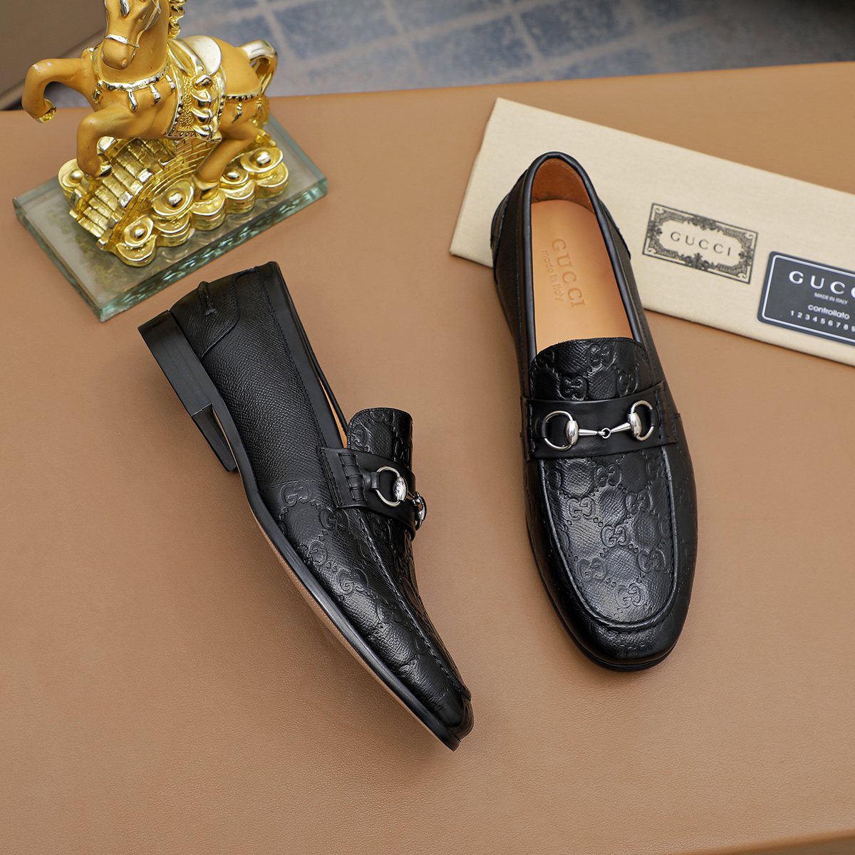 Gucci Black Embossed Loafers